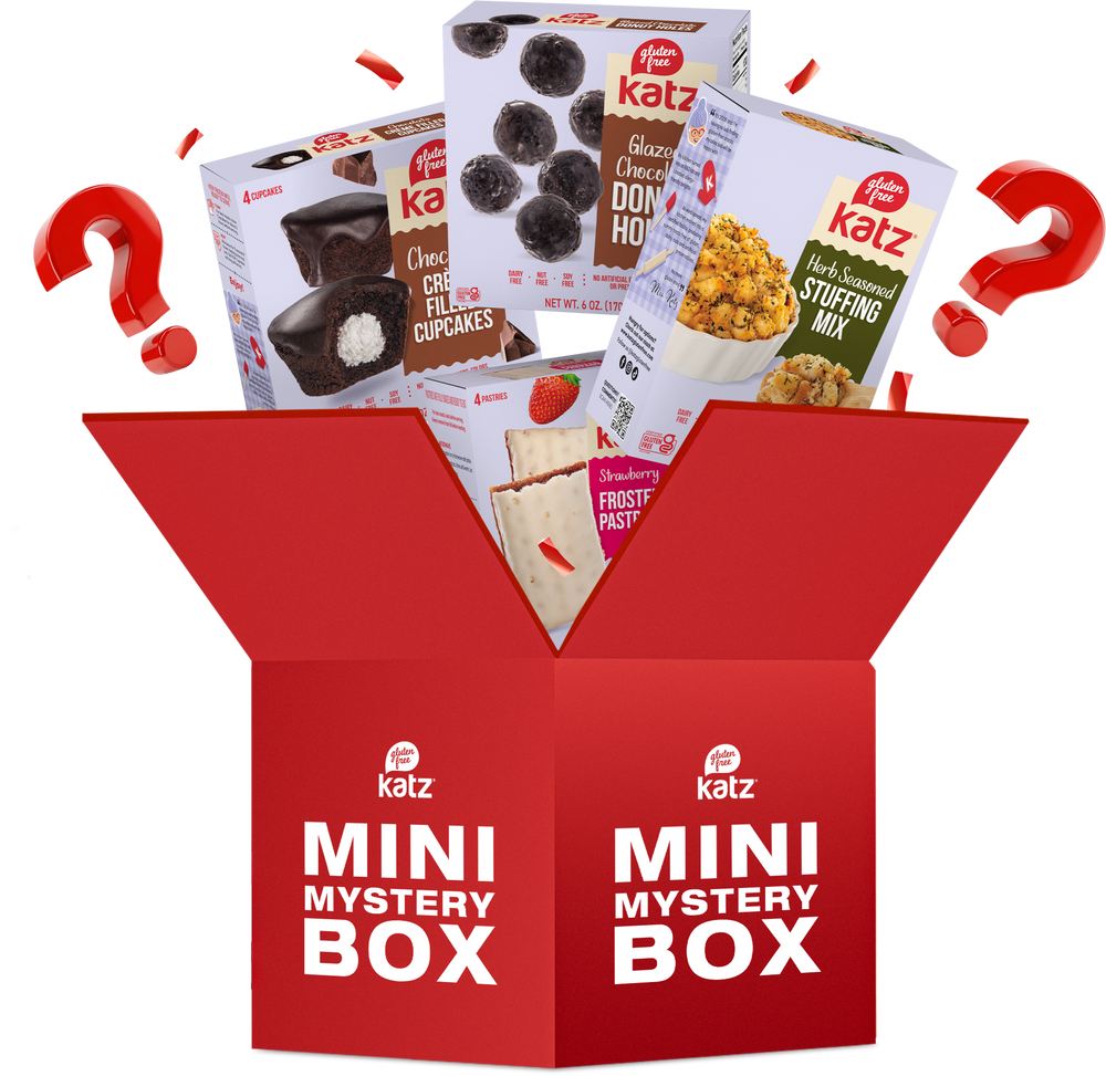 Red Mini Mystery Box carton with snack mix and frosting pastry packets