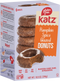 Pumpkin spice glazed donuts in branded box with one glazed donut