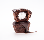 Chocolate crème filled cupcakes, dark cakes with white crème center and chocolate drizzle
